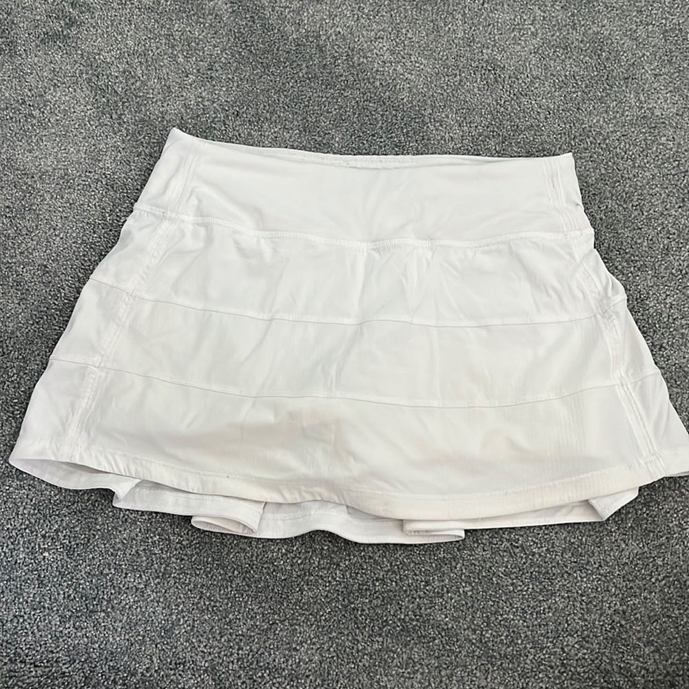lulu tennis skirt with spandex shirts size 4